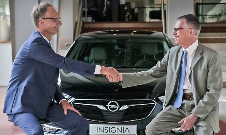 Opel-CEO Michael Lohscheller en PSA Group-CEO Carlos Tavares